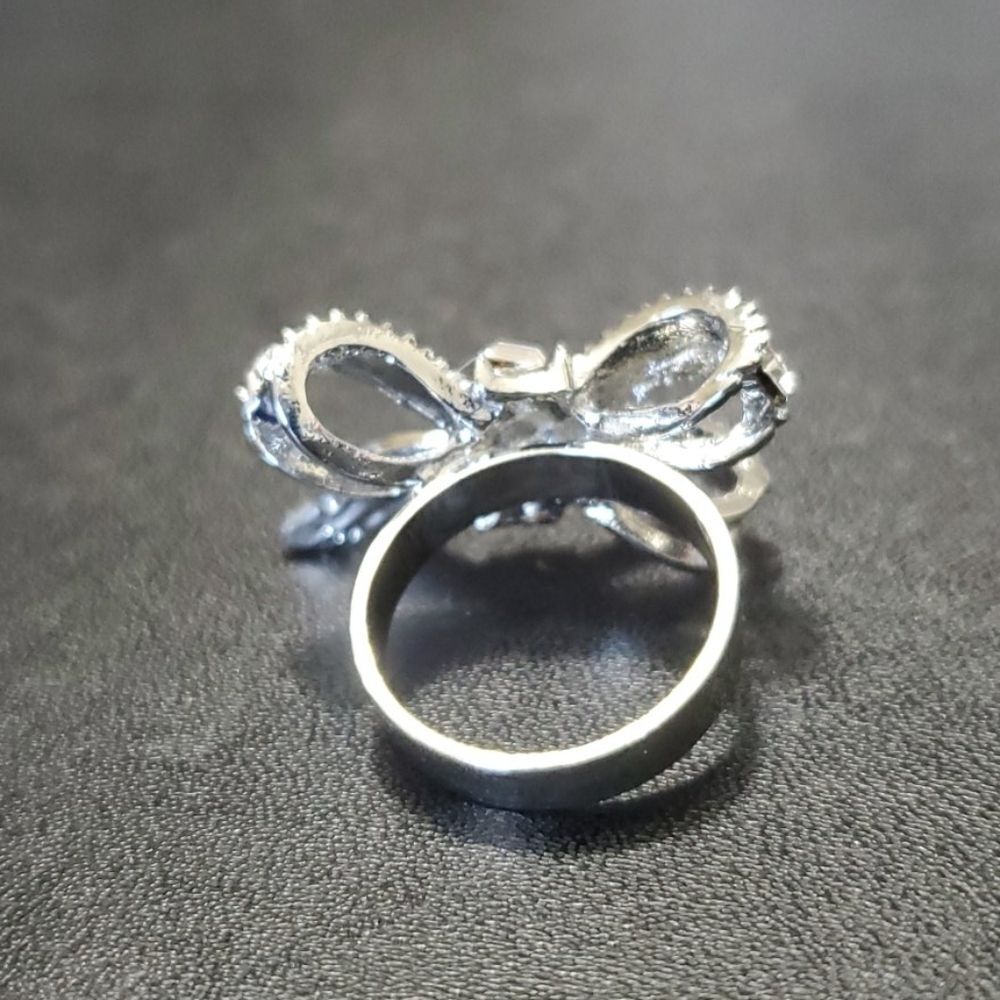 Silver tone bow ring 6.25 clear rhinestone - Picture 5 of 10